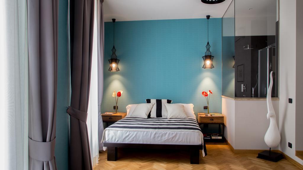 Qt Suites Roma Room photo
