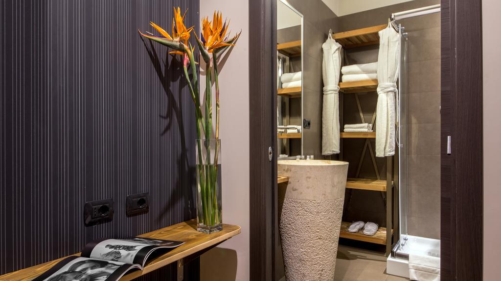 Qt Suites Roma Room photo