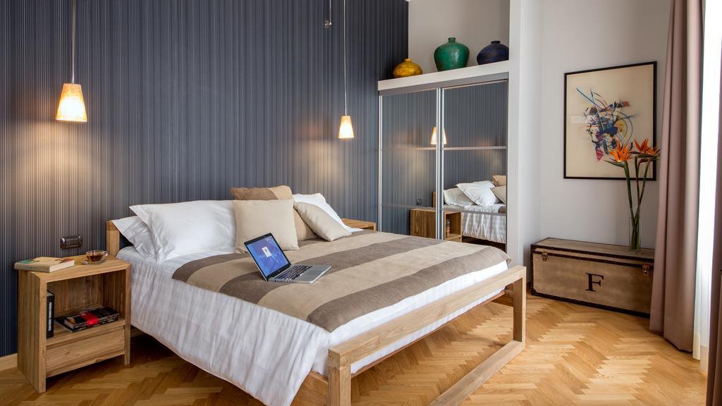 Qt Suites Roma Room photo