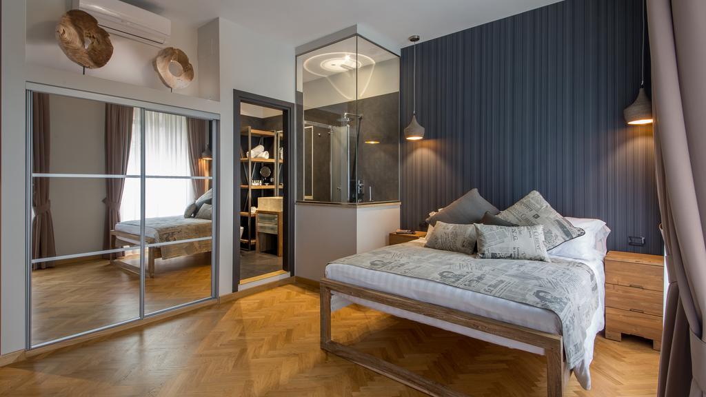 Qt Suites Roma Room photo