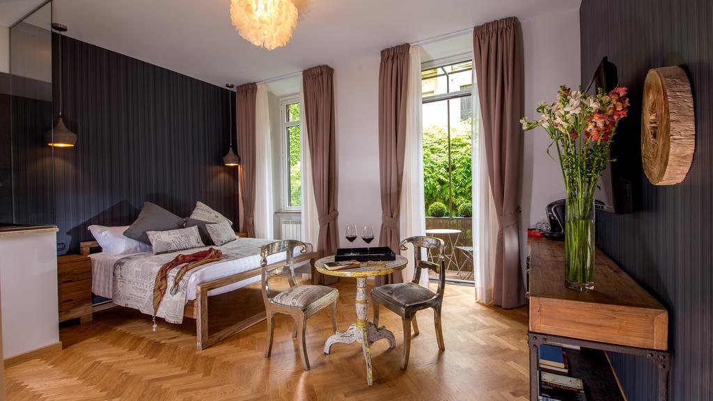 Qt Suites Roma Room photo
